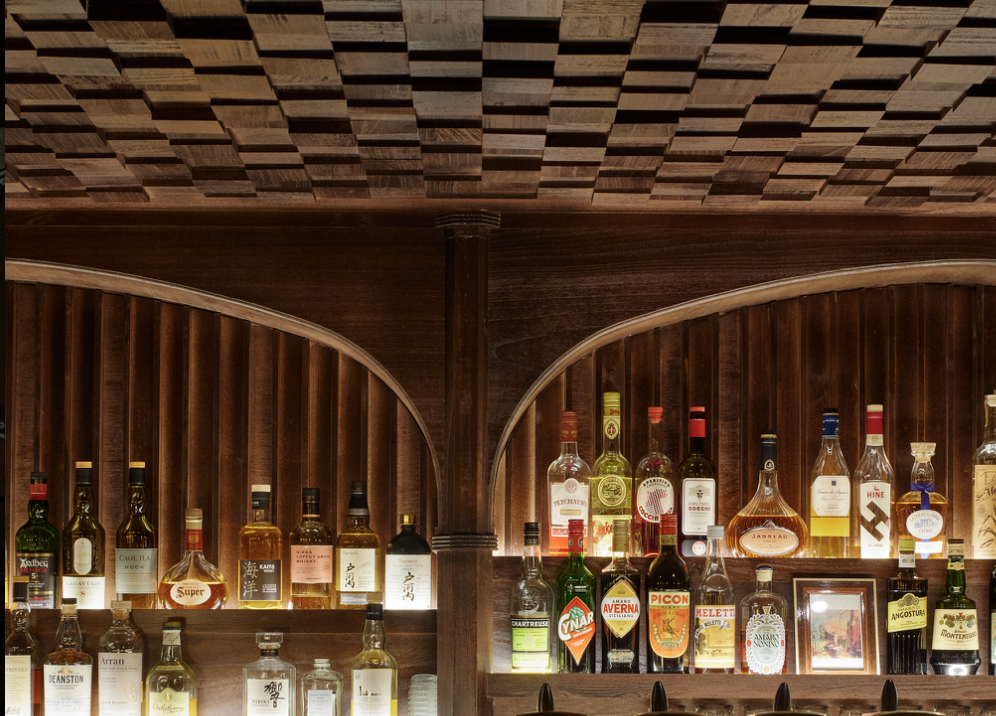 Timber acoustic installation details arranged in a workshop setting.